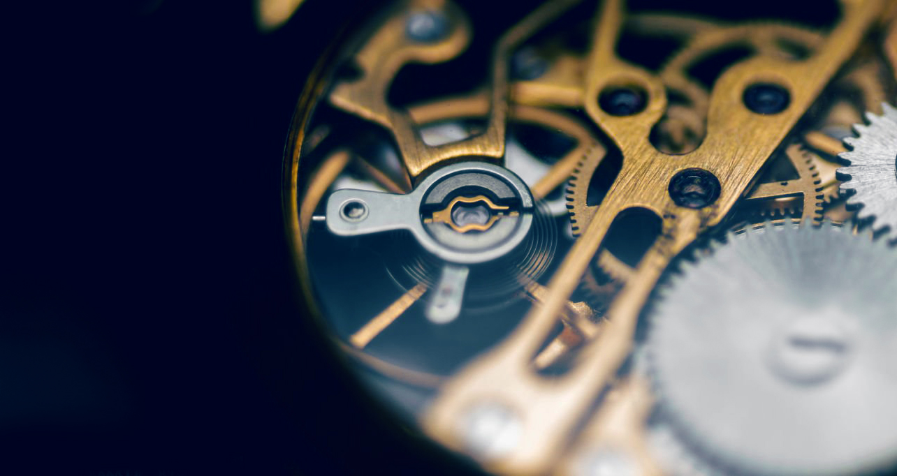 background image showing gears of a clock