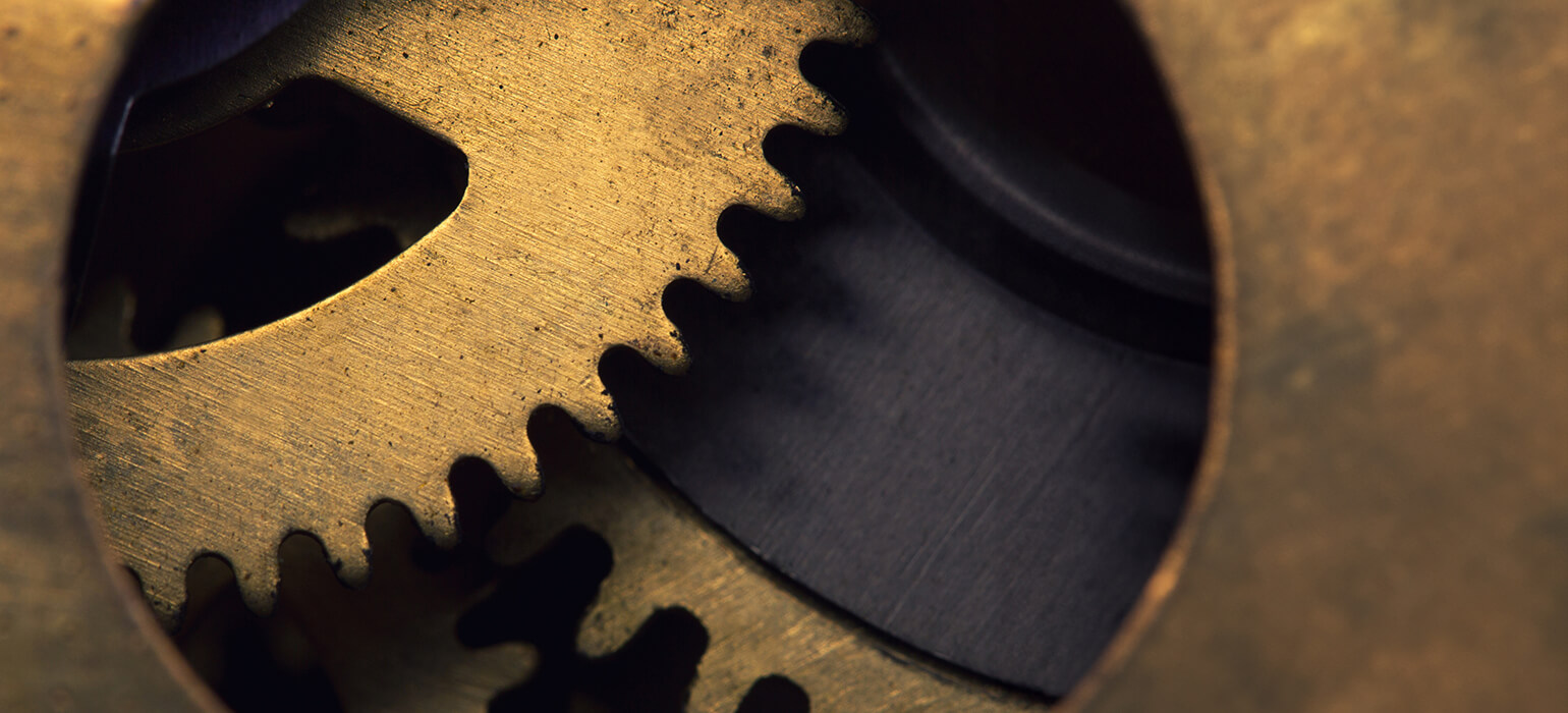 background image showing gears of a clock